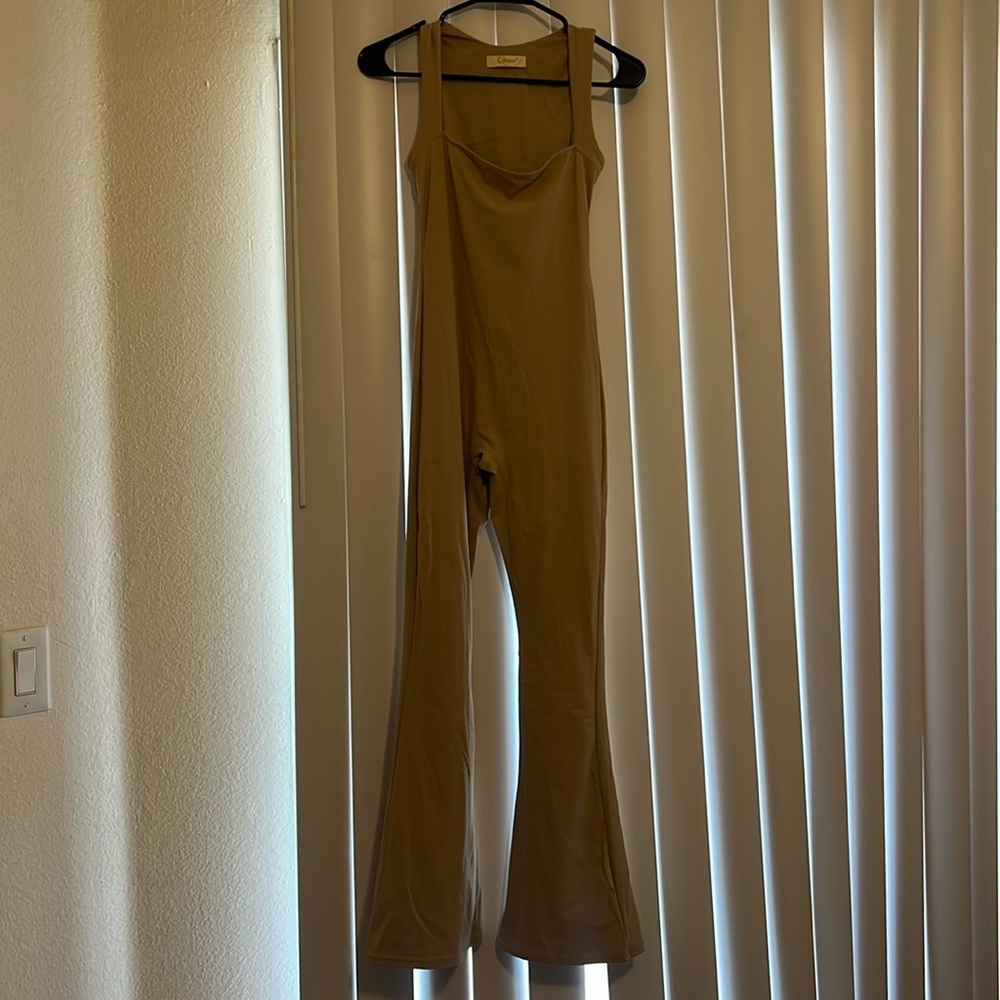 Cute cream jumpsuit!